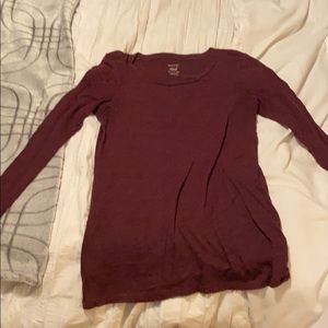 Maroon long sleeve t shirt.